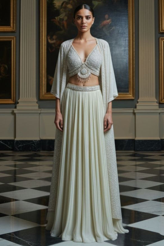 Ivory Pearl Lehenga with Sheer Cape