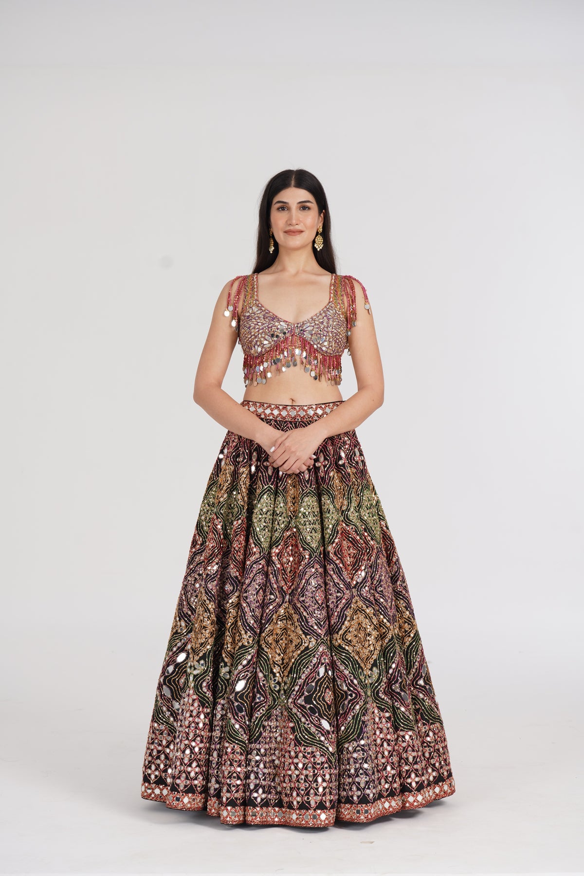 Abhinav Mishra - Matte black lehenga embellished using warm pastels