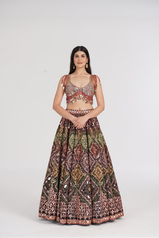 Abhinav Mishra - Matte black lehenga embellished using warm pastels