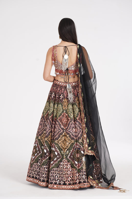 Abhinav Mishra - Matte black lehenga embellished using warm pastels
