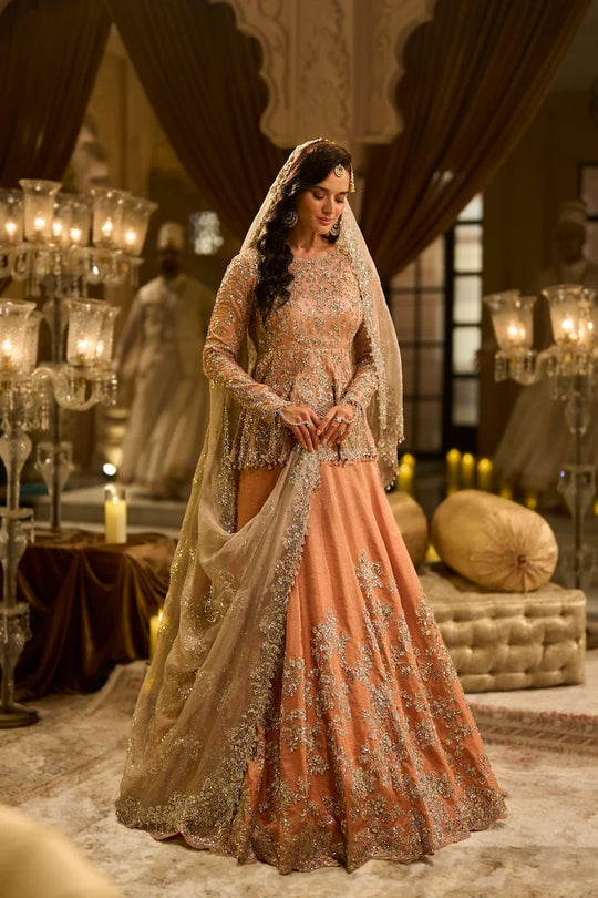 Seema Gujral - Peach Peplum Tissue Lehenga Set